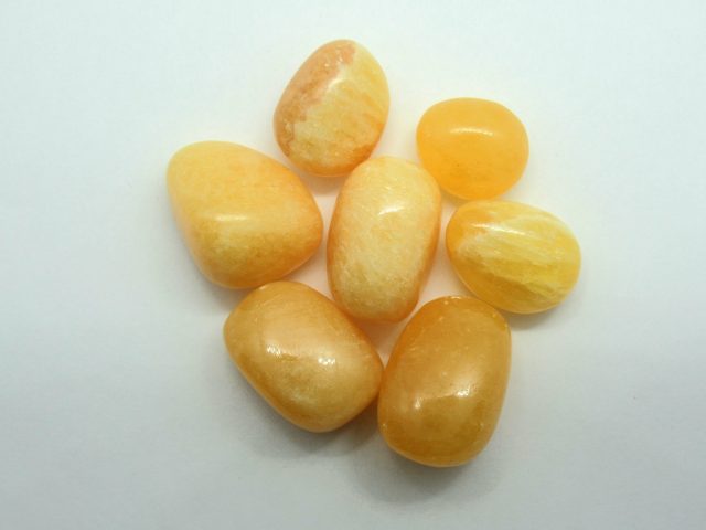 Healing Light Online Psychic Readings and Merchandise Orange Calcite Tumblestone from Mexico